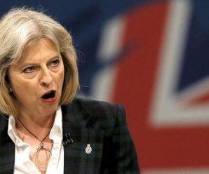 英议会通过脱欧法案引抗议 首相称月底前启动脱欧